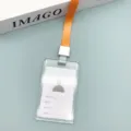 Transparenter Ausweishalter aus Kunststoff mit orangefarbenem Lanyard für Schülerausweise. - Schiebehalter mit langem Schlüsselband / Orange