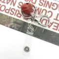 Metal keychain with red bell and lobster clasp, perfect for DIY bag charm accessories. - Red