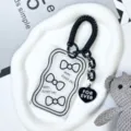 Transparent card holder keychain with spring lanyard, bow print, and black heart pendant. - Bow Style / Black Double-Spring Rope (Heart Acrylic)