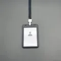 Black plastic ID badge holder with lanyard for office badges, school cards and access passes. - With Lanyard / Black