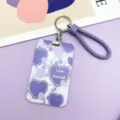 Purple heart print card holder with braided wrist strap and metal ring for daily commute use. - White Background Purple Heart / Purple Edged Hand Rope