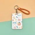 Cute orange rabbit pattern plastic sliding card holder with wrist strap and keychain. - Plaid Orange Rabbit (Orange Leather Cord)