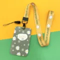 Cute daisy print card holder with matching lanyard, ideal for student ID or work badge use. - Small White Flowers / Yellow Floral Long Lanyard / Green