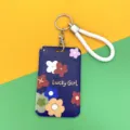 Niedlicher Blumen-Kartenhalter mit Umhängeband und Schlüsselring, Schülerausweis-Schutzhülle. - Kleine Blume / Weiße Kordel / Blau
