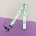 Green dinosaur print polyester neck lanyard for ID cards, keys, and phones, cute everyday accessory. - Little Dinosaur Long Lanyard