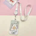 Cute cartoon cat card holder with retractable lanyard set, perfect for students and office workers. - Fishing Cat + Cute Planet Rabbit Retractable Reel Long Rope (Beige Bear Head)
