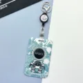 Cartoon astronaut badge holder with retractable reel and keychain for student bus card ID card - Green Standing Astronaut / Black Retractable Buckle (Planet)