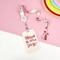 Pink cute student cartoon card holder with lanyard, retractable reel and durable ABS card case. - Spotted Beige Letters / Retractable Long Lanyard