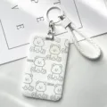 Simple white card holder with cute green bear print, braided wrist strap and metal keychain. - Line Art Bear with White Edged Leather Cord