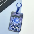 Blue astronaut card holder with keychain, durable plastic card sleeve for students and daily use. - Blue Standing Astronaut / Blue Handcuff Clasp