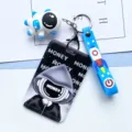 Cute Astronaut Hard Plastic Card Holder Student ID Badge Protector with Lanyard - Mysterious Hooded Man with Blue Astronaut Figurine