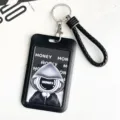 Portatarjetas de identificación negro con llavero y diseño de astronauta para oficina y estudiantes. - Estilo Hombre Con Capucha Misterioso / Portatarjetas Con Cordón de Cuero