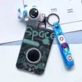 Cute astronaut ID card holder with rocket lanyard and keychain for students school. - Green Astronaut on Black Background + Blue Astronaut Figurine