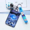 Blue astronaut hard-shell card holder with rocket strap, student ID protective case. - Blue Standing Astronaut & Blue Astronaut Figurine
