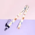 Cute cartoon bear pattern neck lanyard with keychain, adorable style for keys and phone. - Cute Bear Cake