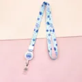 Blue checkered cartoon lanyard with retractable badge reel for ID cards and keys. - Plaid Blueberry Girl (Retractable Lanyard)