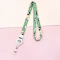 Green cartoon puppy print lanyard with retractable badge reel, cute style for student ID cards. - Black Ear Dog (Retractable Lanyard)