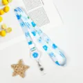 Blue cartoon flower lanyard with retractable reel and clear badge holder for students and office. - Blue Smile Flower (Retractable Lanyard)