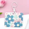 Sliding floral ID card holder with keychain, cute blue flower pattern for students. - Five-Petal Flower / With White Handcuff Clasp / Green and Pink