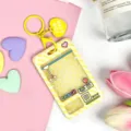 Yellow claw machine transparent card holder keychain keychain cute cartoon student bus pass protector - Yellow Grid Game Console with Yellow Heart Keychain