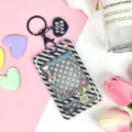 Cute claw machine transparent card holder with keychain, stylish student transit pass protective sleeve. - Black Grid Game Console with Black Heart Keychain