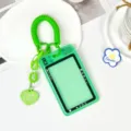 Green camera shape card holder with spring coil wristlet and heart charm for student bus pass. - Spring Rope Heart Charm Style / Green