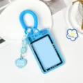 Blue camera shape transparent student card holder with coil strap and heart pendant keychain. - Spring Rope Heart Charm Style / Blue