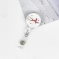Retractable nurse badge reel with cute stethoscope design, perfect for holding ID cards and keys securely. - Red Cross Stethoscope Style
