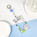 Transparent acrylic ID card holder with retractable badge reel and cute cartoon graphics. - Peach Cow + White Retractable Buckle (Blue Smiley) / Sliding Transparent / Blue Smiley Accessory