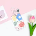 Tarjetero deslizante floral con llavero, funda protectora transparente para tarjetas de estudiante. - Flor Cuatro Hojas Una Flor / Llavero de corazón blanco