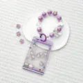 Cute claw machine shaker card holder with purple beaded wrist strap, clear student ID badge case. - Purple Claw Machine Pajama Bear Shaking / Sliding Transparent With Colorful Purple Bow