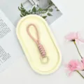 Short woven wrist lanyard strap with metal ring for phone cases and keys anti-lost pink - Pink
