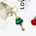 Cute Christmas tree acrylic keychain with gold ring and metal bell, perfect bag pendant. - Christmas Tree / Bell Keychain