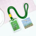 Cute cartoon dinosaur lanyard card sleeve for students school ID card holder with shaking charm. - Green Dinosaur (Green Border) / Green Long Braided Rope
