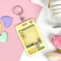 Cartoon clear card holder ID badge protector with cute claw machine design and keychain for daily use. - Yellow Grid Game Console + Leather Strap Round Buckle