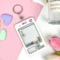 Cute cartoon claw machine card holder with keychain, perfect for bus cards and ID badges. - White Grid Game Console + Leather Strap Round Buckle