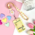 Cute cartoon claw machine transparent card holder with matching lemon lanyard for students. - Yellow Grid Game Console + Gingham Lemon Tiger Retractable Long Rope