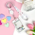 Cute cartoon transparent ID card holder with lanyard and easy pull buckle for students. - White Grid Game Console + Japanese Bear Retractable Long Rope