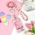Pink cartoon claw machine ID card holder with matching lanyard and badge reel for students. - Pink Grid Game Console + Gingham Strawberry Rabbit Retractable Long Rope