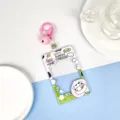 Clear plastic ID card holder with cute peach cow design and pink keychain charm variant. - Peach Cow With Pink Bell Lobster Clasp / Sliding Transparent