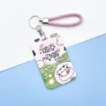 Cute cartoon cow card holder with pink braided strap for student ID and bus passes. - Peach Cow / Pink Cord