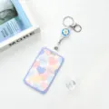 Transparent ABS badge card holder with retractable reel and cute heart pattern design. - Blue Border Colorful Hearts / Blue Flower Retractable Badge Reel
