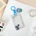Transparent student sliding card holder with blue flower charm and keychain for ID badges. - Lily of the Valley Pattern / Blue Flower Keychain