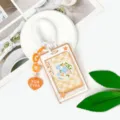 Portabadge rigido trasparente con cordino per studenti porta carte d'identità decorato. - Fumetto Stella - Griglia Arancione Floreale / Corda a Molla + Ciondolo a Cuore / Arancione
