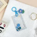 Clear acrylic card holder with blue keychain and cute floral design, ideal for student ID or access cards. - Blue Flower Pattern / Blue Flower Keychain