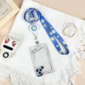 Blue floral lanyard with retractable reel and clear card sleeve for student ID access. - Lily of the Valley Pattern / Blue Floral Retractable Lanyard