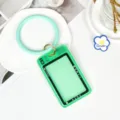 Transparent camera card holder with mint green silicone ring keychain for daily commute and ID cards. - Hoop With Ring Charms / Green