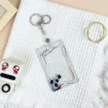 Transparent acrylic card holder keychain with cute lily of the valley floral design and badge reel. - Lily of the Valley Pattern / Leather Strap Metal Clasp