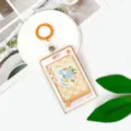 Portabadge rigido trasparente con anello arancione astuccio per carta studente inserto floreale - Fumetto Stella - Griglia Arancione Floreale / Portachiavi in Pelle Arancione / Arancione