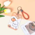 Lindo tarjetero deslizante ABS de cachorro naranja con correa trenzada para tarjetas. - Perro Naranja Pastel + Correa de Mano Naranja